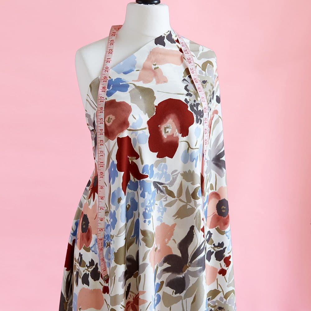 Floral print challis fabric draped on a mannequin - Minerva