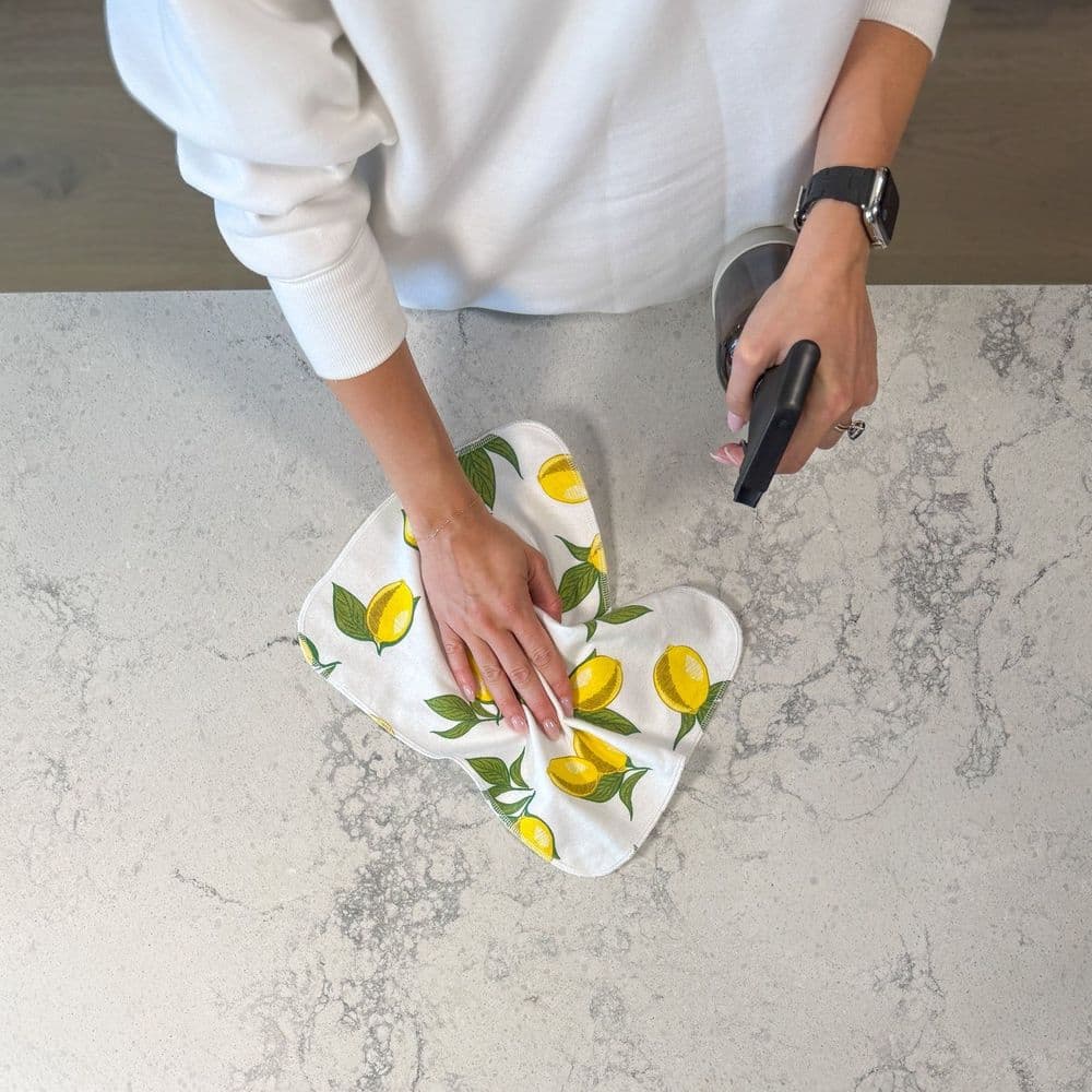 Earthly Co. reusable paper towel being used to wipe a kitchen counter