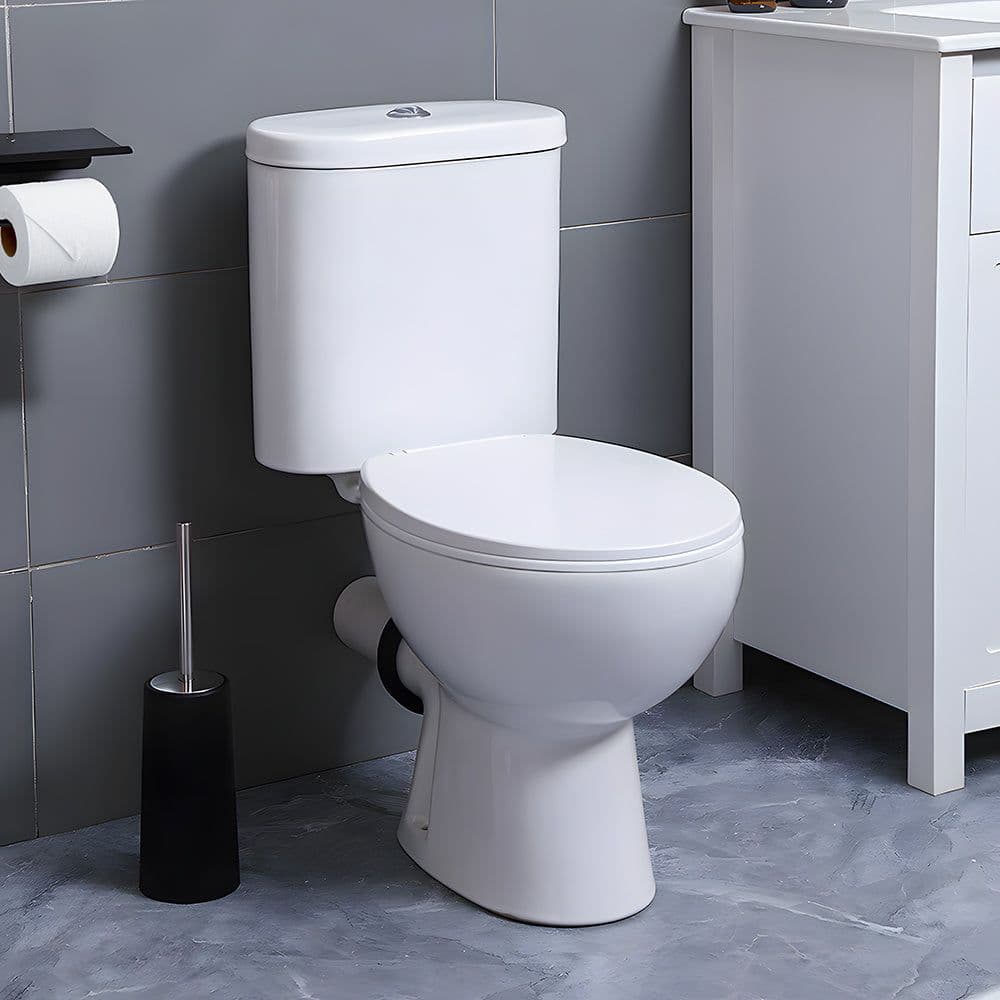 SNFLEX upflush macerating toilet installed in a bathroom, no floor drain required